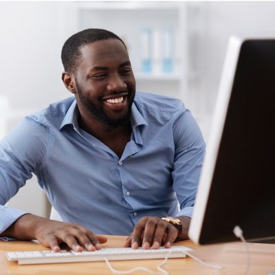 Administrator Working on Computer