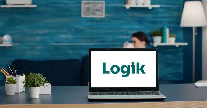 laptop on table with Logik